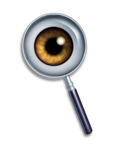 eye behind a magnifying glass, keyword search